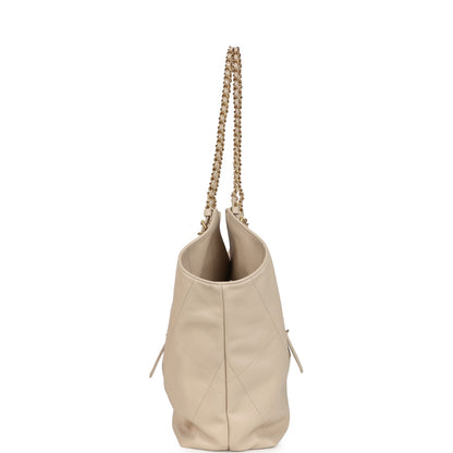 Chanel Maxi Coco Shopping Bag Beige Calfskin Antique Gold Hardware